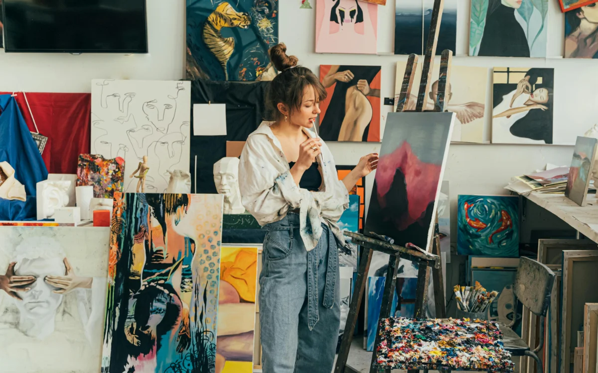 A Woman Painting on a Canvas